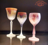 Interior Glass Designs ; Best fit for Lit Glass Shelves ~ Lead Crystal Fancy Stemware Glasses suitable for Groom and Bride ~3 transparent colors in one Cone shaped footed Glass Magenta Red Rim followed by Light Golden Yellow, followed by Light Silver , followed by Transparent white angled Stem or so called foot~ The surface magically shimmers.  Colored Lead Crystal Stemware - Named Heart - Own&Adore MysticLandPainted Creations ~ Hebron Glass