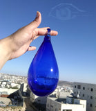 longdesc="Transparent Cobalt Blue Blown Glass oval shaped Ball Tear Drop, Mystic Land Painted Creations, Hanging glass Droplet, Patio Decorations, Christmas Tree decorations, 7 inch height , 5 inch and 3 inch, Sun Catcher, Drop shaped Blue glass - Hebron Blown Glass "