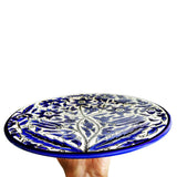 Held in hand. Glazed shiny surface of Cobalt Blue White Floral Plate Palestinian Arts
