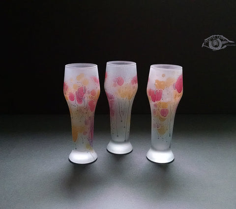 3 long dick shaped cups of Baby Blue color splashed with spots of Blush and Golden. German cast Glassware stained in Hebron Palestine. We like to call it Nolan's Party Fever .